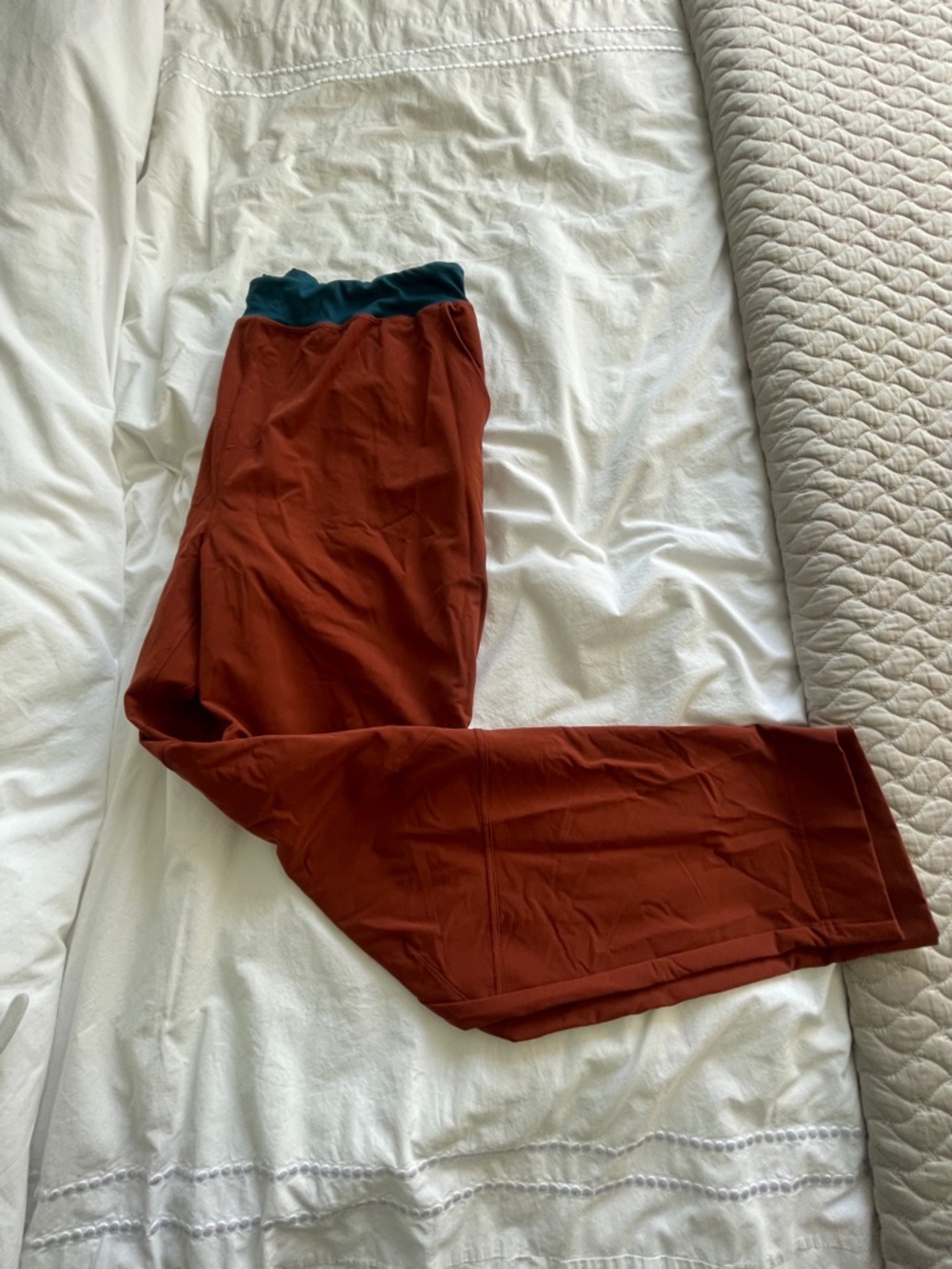 cotopaxi rust mens pants with teal waistband